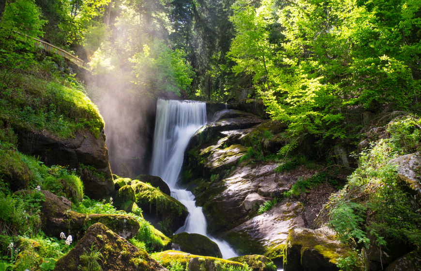 Black Forest Triberg Waterfall with vapour and sunshine